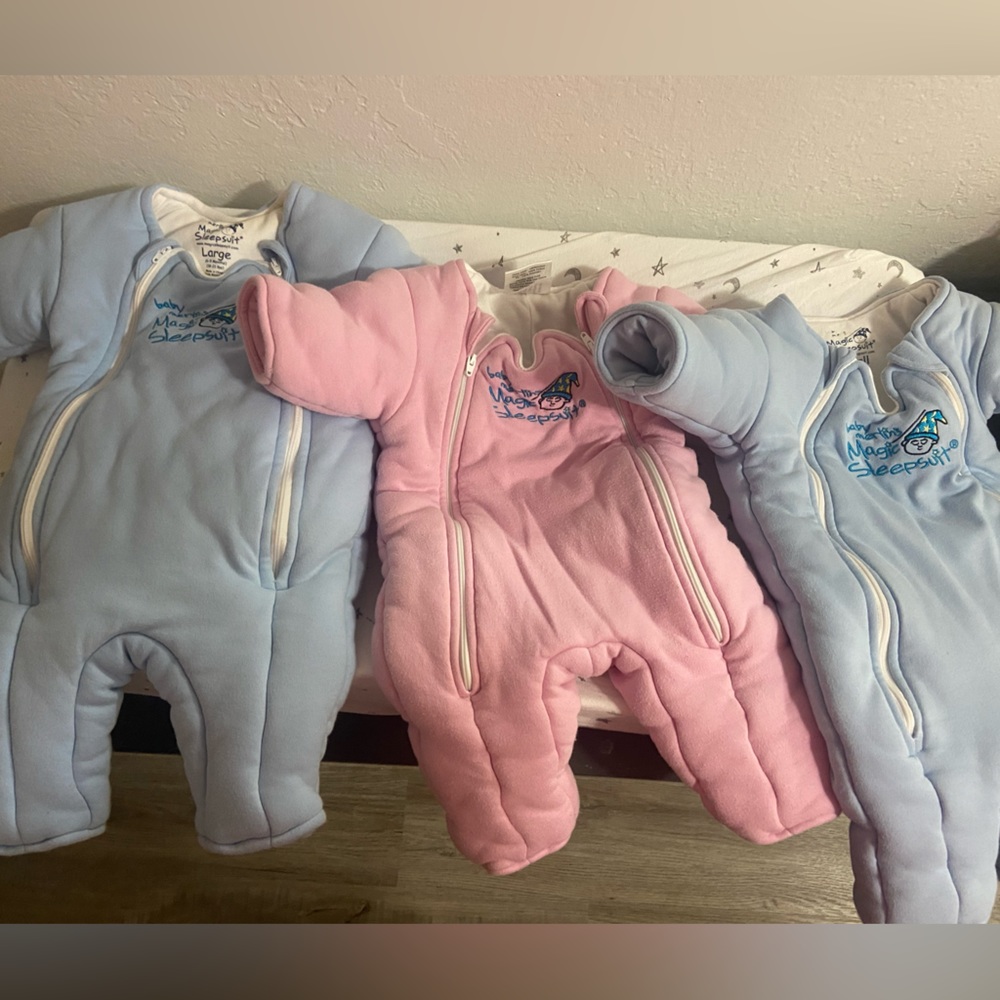 Baby Merlin Magic Sleep Suits Small and Large